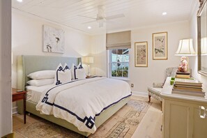 Bedroom featuring King bed, crisp & white bed linens, ultra comfortable mattress