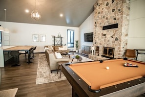 Don't wait for the perfect shot, make the perfect shot on this pool table just off living area.