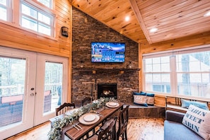 Beautiful stone fireplace. Perfect for cozying up on chilly nights or during winter stays!