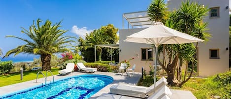 Beautiful villa with private pool, terrace, and garden with sea views