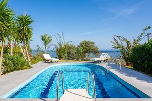 Private pool, terrace, and garden with sea views