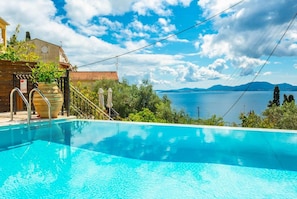 Private infinity pool and terrace with sea views