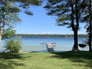 Private dock on North Lake Leelanau. Hard sand bottom shallow area for swimming 