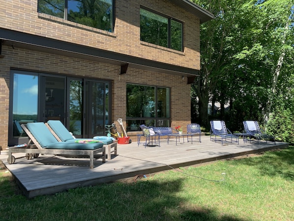 East facing patio overlooking North Lake Leelanau.  View sailing and watersports