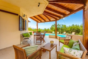 Sheltered terrace with outdoor seating