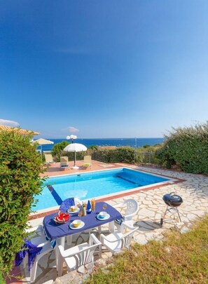 Private pool and terrace area with sea views