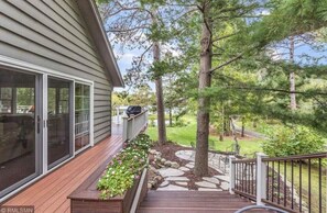 Deck leading to the firepit and beach