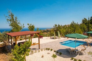 Private pool and terrace area with panoramic sea views