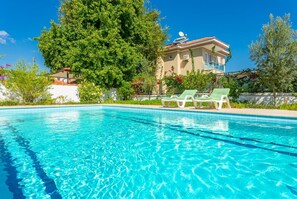 Private pool, terrace, and garden