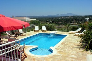 Private pool, terrace, and lawn 