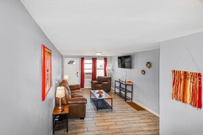 The TV provides endless entertainment options, allowing you to stream your favorite shows and movies for a relaxing experience.
