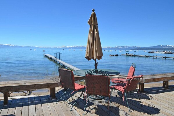 Just steps away from a shared deck and the stunning Lake Tahoe shoreline for easy lakeside relaxation