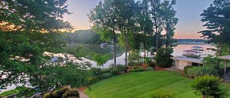 Sunrise over the cove with coffee on the deck.