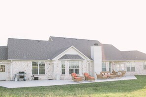 Cook out on the porch on our propane grill and lounge on the patio furniture.