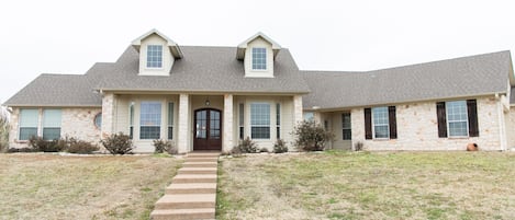 Enjoy a luxurious ranch retreat at our 5 bedroom, 3.5 bath home!