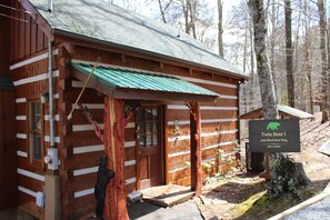 Enjoy our spacious new porch, with custom carvings by a local artisan.