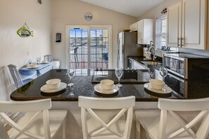 Bar Seating - Fully Stocked Kitchen