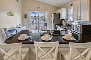 Bar Seating - Fully Stocked Kitchen