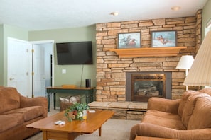 Enjoy the propane fireplace and Smart TV in the living room