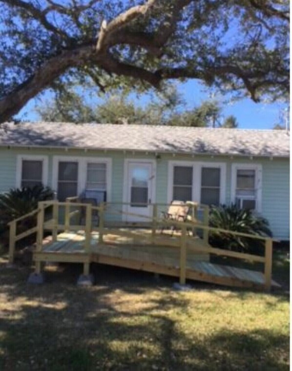 Newly added front porch allows for birdwatching or simply relax.