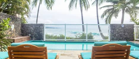 Private pool is backed by the ocean