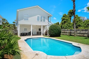 Fenced area with private pool