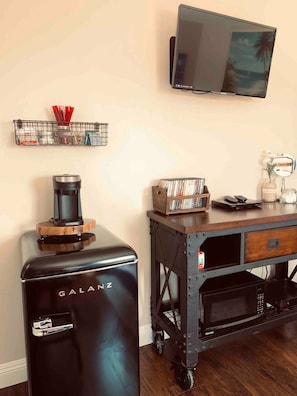 Mini fridge microwave and single brew coffee smart TV