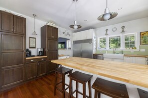 Kitchen and pantry with coffee station