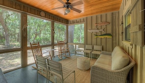 Screened in porch on backside of house
