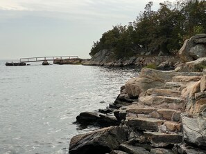 Stairs from beach with Little Point swimming dock in distance. 