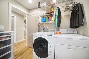 Full laundry facilities along with a utility sink. 