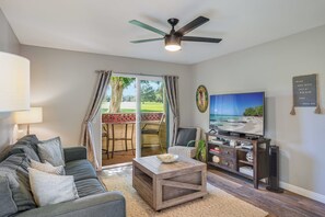Living room offers views of lush golf course (2)