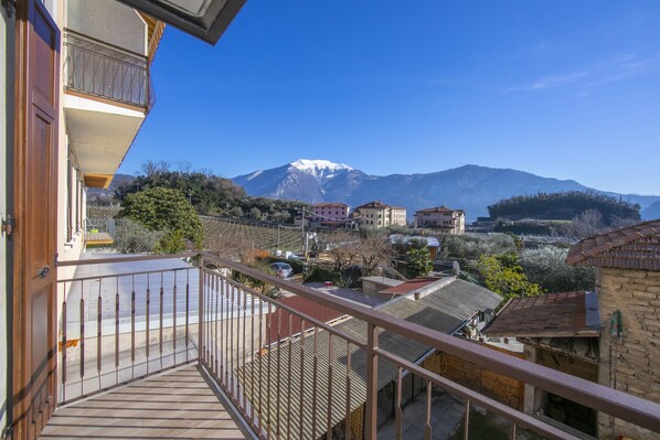 The balcony with a wonderful view of the mountains towards the lake