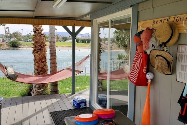 Side portion of the wrap around porch includes a picnic table