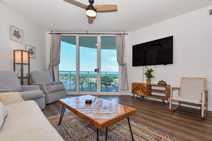 The Palms of Destin 1612 - Living Area with TV and Balcony Access