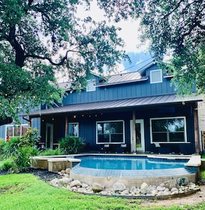 View of home and pool from the back yard