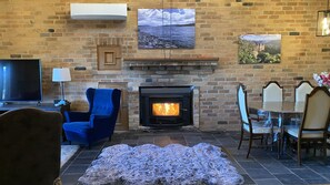 Real wood burning fireplace in the lounge room