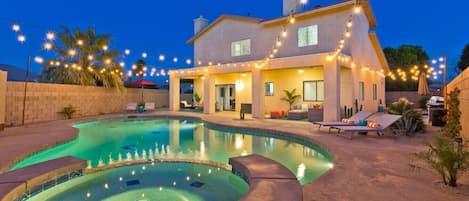 Backyard space: pool/spa, seating area, lounge chairs, propane grill, dining table, billiards