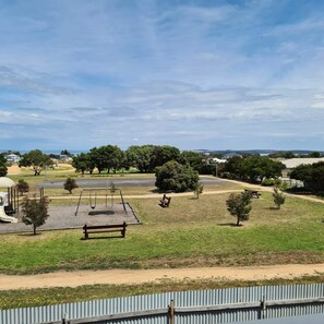 View of Coronet Bay Recreation Reserve from the deck.  gate access to the park