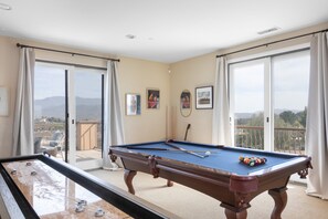 Game room: pool, shuffleboard, and family room.