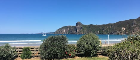 View from balcony over lawn and bay