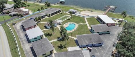 18 units with heated pool and sandy beach