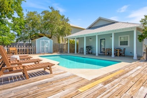 Beautiful backyard pool - with sun and shade areas to unwind!
