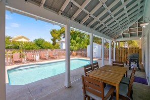 Enjoy poolside dining with outdoor lighting too.