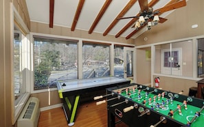 Indoor Game Room with Air Hockey and Foosball Table