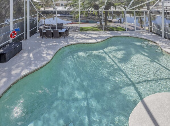 Breath-taking views from second floor master bedroom patio and accessible canal.