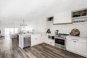 The kitchen is open to the dining room and living room.