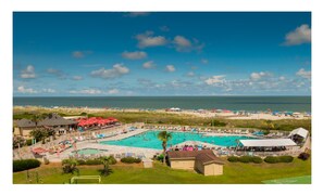 Largest pool on HHI with Kids pool, bar and grill at the beachline.
