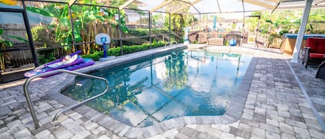 Enjoy the heated pool/hot tub all year. No worries about snow here! 