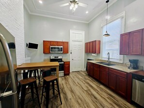 Fridge with ice, range/oven, disposal, dishwasher, tv, microwave. 